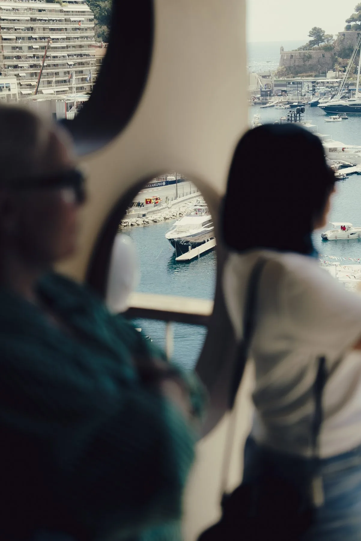 Guests looking out over the harbour from the 4th-floor Beau Rivage Gold terrace during the Monaco Grand Prix