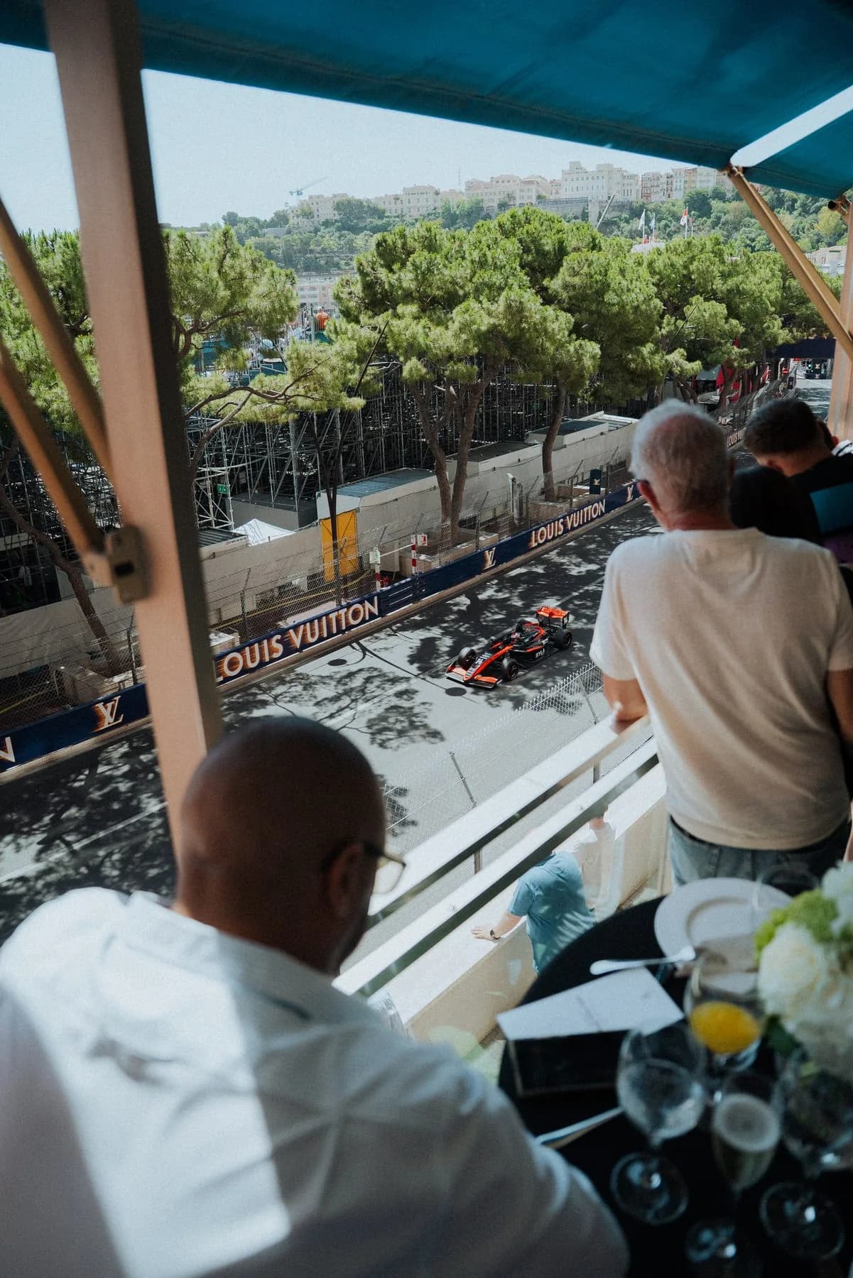 Guests watching the cars pass from the Bronze Caravelle terrace during the Monaco Grand Prix