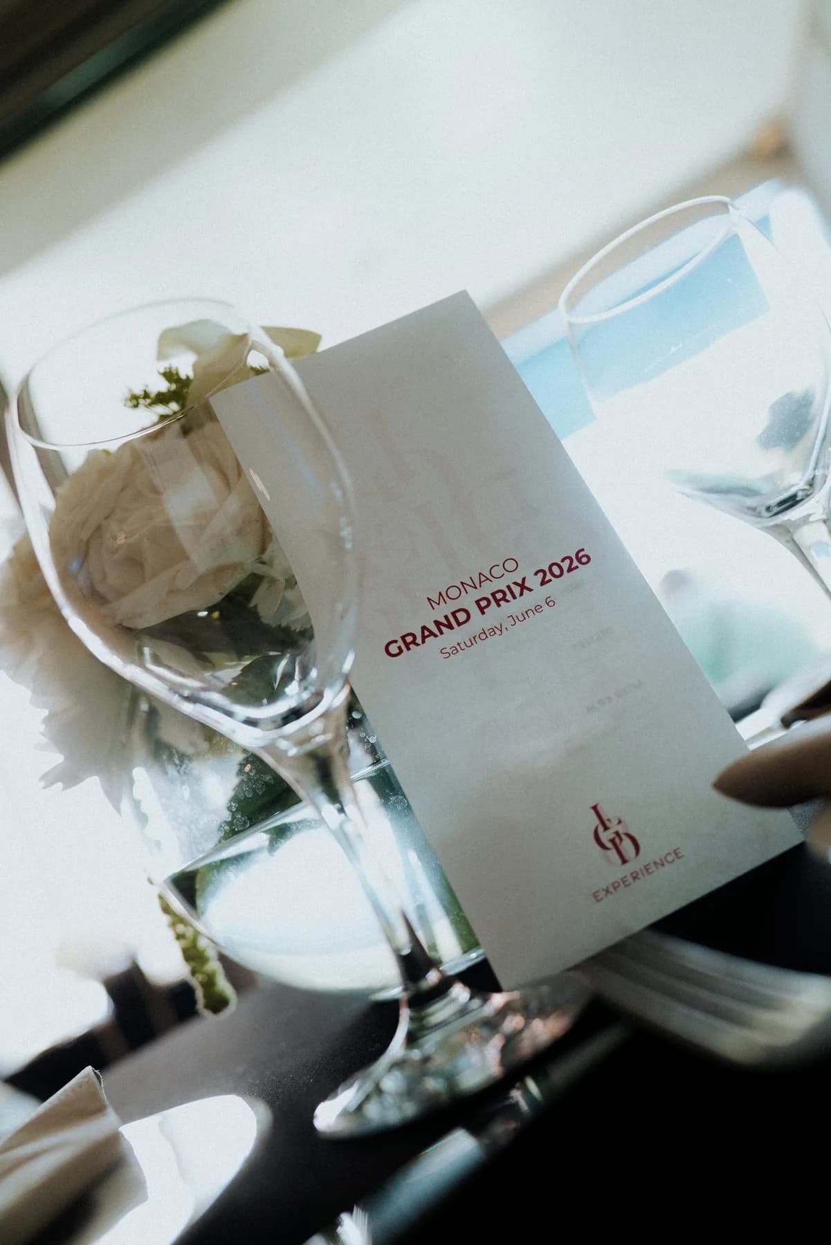 Glass and table card on the Bronze Caravelle terrace during the Monaco Grand Prix